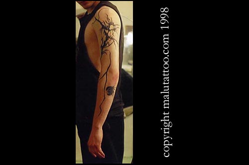 Tribal Tattoo Arm of Cracks